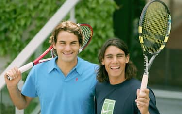 PARIS - JUNE 02:  Roger Federer of Switzerland and Rafael Nadal of Spain stand side by side as they pose for photos prior to their semi-final match tomorrow during the eleventh day of the French Open at Roland Garros on June 2, 2005 in Paris, France.  (Photo by Clive Mason/Getty Images)