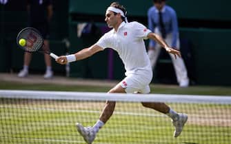 LONDON, ENGLAND - JULY 07: Roger Federer of Switzerland in action during the Men's Singles Quarter Final against Hubert Hurkacz of Poland (not pictured) at The Wimbledon Lawn Tennis Championship at the All England Lawn and Tennis Club at Wimbledon on July 7th, 2021 in London, England. (Photo by Simon Bruty/Anychance/Getty Images)