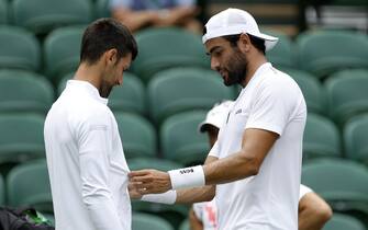 Matteo Berrettini checks out the clothing worn by Novak Djokovic on centre court ahead of the 2022 Wimbledon Championship at the All England Lawn Tennis and Croquet Club, Wimbledon. Picture date: Thursday June 23, 2022.