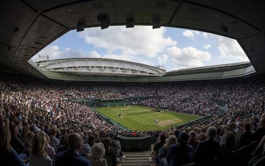 General view of Centre Court as Roger Federer plays against Hubert Hurkacz in the quarter-final of the Gentlemen's Singles on day nine of Wimbledon at The All England Lawn Tennis and Croquet Club, Wimbledon. Picture date: Wednesday July 7, 2021.