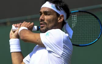 epa09317277 Fabio Fognini of Italy in action during his third round match against Andrey Rublev of Russia at the Wimbledon Championships in Wimbledon, Britain, 02 July 2021.  EPA/FACUNDO ARRIZABALAGA   EDITORIAL USE ONLY