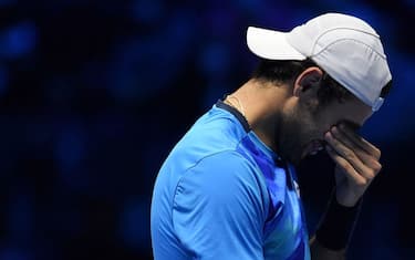 Italy's Matteo Berrettini reacts as he quits the game after being injured during his first round singles match against German's Alexander Zverev at the ATP Finals at the Pala Alpitour venue in Turin on November 14, 2021. (Photo by Marco BERTORELLO / AFP) (Photo by MARCO BERTORELLO/AFP via Getty Images)