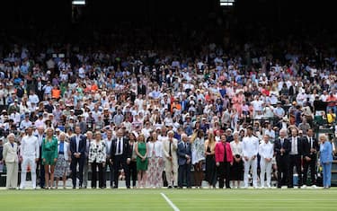 Wimbledon Tournament's former winners pose for a family photo during the Centre Court Centenary Ceremony, on the seventh day of the 2022 Wimbledon Championships at The All England Tennis Club in Wimbledon, southwest London, on July 3, 2022. - RESTRICTED TO EDITORIAL USE (Photo by Adrian DENNIS / AFP) / RESTRICTED TO EDITORIAL USE (Photo by ADRIAN DENNIS/AFP via Getty Images)