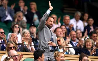 Gareth Southgate waving from the Royal Box during day six of the 2022 Wimbledon Championships at the All England Lawn Tennis and Croquet Club, Wimbledon. Picture date: Saturday July 2, 2022.