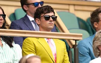 Tom Daley (second right) and Dustin Lance Black (right) in the Royal Box during day six of the 2022 Wimbledon Championships at the All England Lawn Tennis and Croquet Club, Wimbledon. Picture date: Saturday July 2, 2022.