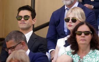 Rami Malek and Lucy Boynton in the Royal Box on day twelve of the 2022 Wimbledon Championships at the All England Lawn Tennis and Croquet Club, Wimbledon. Picture date: Friday July 8, 2022. (Photo by Adam Davy/PA Images via Getty Images)