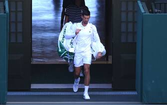 LONDON, ENGLAND - JULY 10: Novak Djokovic of Serbia enters the court for their Men's Singles Final match against Nick Kyrgios of Australia on day fourteen of The Championships Wimbledon 2022 at All England Lawn Tennis and Croquet Club on July 10, 2022 in London, England. (Photo by Shaun Botterill/Getty Images)