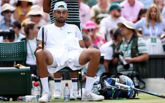 LONDON, ENGLAND - JULY 10: Nick Kyrgios of Australia looks on during a changeover against Novak Djokovic of Serbia during their Men's Singles Final match on day fourteen of The Championships Wimbledon 2022 at All England Lawn Tennis and Croquet Club on July 10, 2022 in London, England. (Photo by Clive Brunskill/Getty Images)