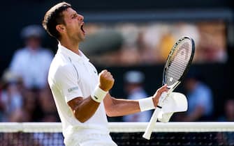 Novak Djokovic celebrates victory in the Gentlemen's Singles Semi Final against Cameron Norrie on day twelve of the 2022 Wimbledon Championships at the All England Lawn Tennis and Croquet Club, Wimbledon. Picture date: Friday July 8, 2022.