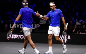 Team Europe's Roger Federer (right) and Rafael Nadal in action against Team World's Jack Sock and Frances Tiafoe on day one of the Laver Cup at the O2 Arena, London. Picture date: Friday September 23, 2022.