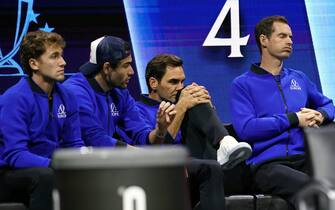 Team Europe's Roger Federer (centre) and Andy Murray (right) watching Cameron Norrie vs Taylor Fritz on day two of the Laver Cup at the O2 Arena, London. Picture date: Saturday September 24, 2022.