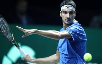 MALAGA, SPAIN - NOVEMBER 24: Lorenzo Sonego of Italy plays a forehand against Frances Tiafoe of United States during the Davis Cup by Rakuten Finals 2022 match between Italy and United States at Palacio de los Deportes Jose Maria Martin Carpena on November 24, 2022 in Malaga, Spain. Photo by Sanjin Strukic/Pixsell