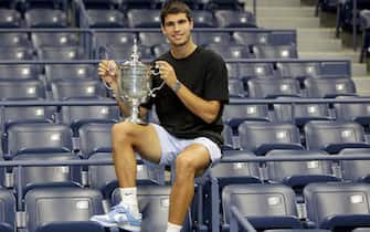 Carlos Alcaraz poses with the US Open Men's Singles Championship Trophy at the Billie Jean King Tennis Center in Flushing Meadows Corona Park in Flushing NY on September 11, 2022. (Photo by Andrew Schwartz)
