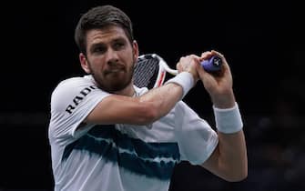 Cameron Norrie of Great Britain in action against Corentin Moutet of Francein the second round during Day Three of the Rolex Paris Masters tennis at Palais Omnisports de Bercy on November 2, 2022 in Paris, France.  in the second round during Day Three of the Rolex Paris Masters tennis at Palais Omnisports de Bercy on November 2, 2022 in Paris, France.