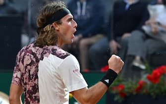 Stefanos Tsitsipas of Greece celebrates a point during his men's singles third round match against Lorenzo Sonego of Italy (not pictured) at the Italian Open tennis tournament in Rome, Italy, 15 May 2023.  ANSA/ETTORE FERRARI  


