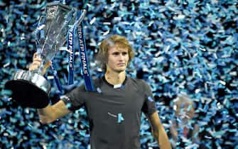 LONDON, ENGLAND - NOVEMBER 18:  Alexander Zverev celebrates with the trophy after defeating Novak Djokovic in the singles Final during Day Eight of the Nitto ATP Finals at The O2 Arena on November 18, 2018 in London, England. (Photo by Hannah Fountain - CameraSport via Getty Images)