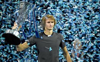 LONDON, ENGLAND - NOVEMBER 18:  Alexander Zverev celebrates with the trophy after defeating Novak Djokovic in the singles Final during Day Eight of the Nitto ATP Finals at The O2 Arena on November 18, 2018 in London, England. (Photo by Hannah Fountain - CameraSport via Getty Images)