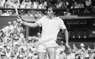 Ilie Nastase, Romanian Tennis Player in action on Centre Court, Wimbledon Tennis Championships, Thursday 24th June 1976. (Photo by Monte Fresco & Mike Maloney/Mirrorpix/Getty Images)
