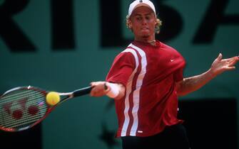 PARIS, FRANCE - MAY 31:  Lleyton Hewitt of Australia plays a forehand during day six of the French Open on May 31, 2003 at Roland Garros in Paris, France. (Photo by Clive Brunskill/Getty Images)