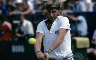 FLUSHING, NY - AUGUST 1980: Tennis player Bjorn Borg from Sweden hits a backhand return against an opponent during the U.S. Open tennis tournament at the USTA National Tennis Center in Flushing, New York, August 1980. (Photo by Focus On Sport/Getty Images)
