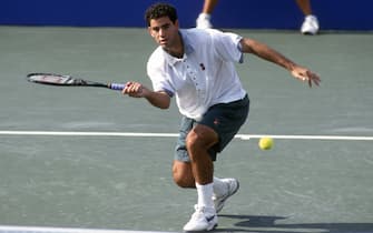 NEW YORK - CIRCA 1996: Pete Sampras of the United States hits a return during a match in the Men's 1996 US Open Tennis Championships circa 1996 at the National Tennis Center in the Queens borough of New York City. (Photo by Focus on Sport/Getty Images)