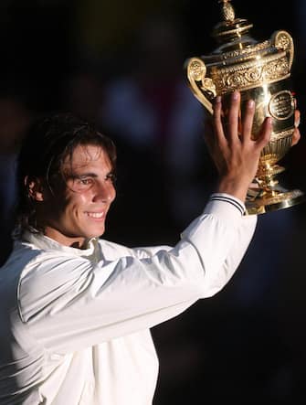 Spain's Rafael Nadal celebrates his victory over Switzerland's Roger Federer in the Mens Final during the Wimbledon Championships 2008 at the All England Tennis Club in Wimbledon.