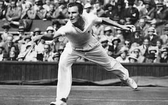 Fred Perry of Great Britain in action Roderich Menzel of Czechoslovakia. After losing the first set 6-0, Fred Perry won the match and went on to win the Championship that year.  (Photo by S&G/PA Images via Getty Images)
