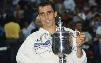 Czechoslovakian tennis player Ivan Lendl with trophy after defeating Swede Mats Wilander to win the 1987 US Open Championship.  (Photo by Rick Maiman/Sygma via Getty Images)