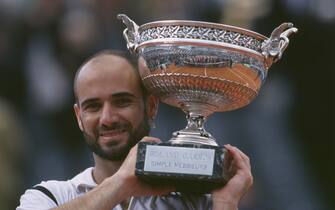 American tennis player Andre Agassi wins the 1999 French Open at Roland Garros after defeating Andrei Medvedev of Russia in the Men's Singles final.   (Photo by Franck Seguin/Corbis/VCG via Getty Images)