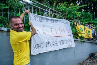 A moment of the event of Legambiente  ''Big Jump a dip in the river Po'', to raise public awareness on the quality of water, Turin, Italy, 12 July 2020.   ANSA/TINO ROMANO