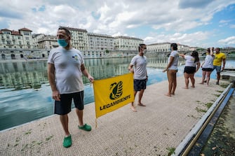 Big jump Legambiente Torino A moment of the event of Legambiente ''Big Jump a dip in the river Po'', to raise public awareness on the quality of water, Turin, Italy, 12 July 2020. ANSA/TINO ROMANO