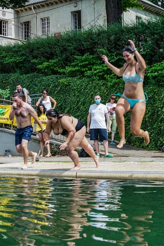 A moment of the event of Legambiente  ''Big Jump a dip in the river Po'', to raise public awareness on the quality of water, Turin, Italy, 12 July 2020.   ANSA/TINO ROMANO