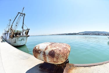 SAN BENEDETTO DEL TRONTO, ITALY - APRIL 24:  The fishing boats are moored and empty at the port of San Benedetto del Tronto because due to Covid-19 all commercial activities are closed.on April 24, 2020 in San Benedetto del Tronto, Italy. Italy will remain on lockdown until May 4th to stem the transmission of the Coronavirus (Covid-19), but some industries are being allowed to reopen.  (Photo by Giuseppe Bellini/Getty Images)