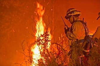 LAKE HUGHES, CA - August 15:    Fire fighters battle the Lake Fire wildfire August 15, 2020 near Lake Hughes, California. Threat remains high to Lake Hughes area as the battle against 23-square-mile blaze continues amid a heat wave. (Photo by Nick Ut/Getty Images)