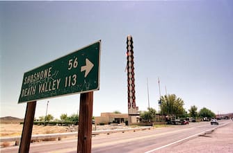 374032 02: The world''s tallest thermometer stands behind a road sign, July 24, 2000 at the "Gateway to Death Valley" in Baker, CA. Standing 134 feet tall, the thermometer was built in 1991 to commemorate the record high temperature of 134 degrees recorded in Death Valley in 1913. During a recent July heatwave, the temperature averaged 118 degrees during the day and barely fell below 100 at night. "Lordy, it was so hot we almost ran clean out of water and sunscreen," said a cashier at the Baker Country Store. "Folks were taking that fancy Perrier water at three dollars a bottle and pouring on their heads just to stay cool." (Photo by Jason Kirk/Online USA)