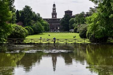 A general view shows the Sforza Castle and the Parco Sempione park on May 4, 2020 in Milan, as Italy starts to ease its lockdown, during the country's lockdown aimed at curbing the spread of the COVID-19 infection, caused by the novel coronavirus. - Stir-crazy Italians will be free to stroll and visit relatives for the first time in nine weeks on May 4, 2020 as Europe's hardest-hit country eases back the world's longest nationwide coronavirus lockdown. (Photo by Miguel MEDINA / AFP) (Photo by MIGUEL MEDINA/AFP via Getty Images)