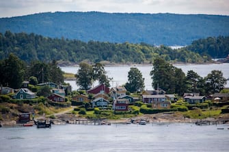 Lindoya island in the Oslo fjord in the Norwegian capital is seen on July 25, 2020. - Lindoya and it's neighbouring Nakholmen and Bleikoya can be reached with the Oslo-boats from Aker Brygge and are known for their cosy weekend and holiday cabins (Photo by Odd ANDERSEN / AFP) (Photo by ODD ANDERSEN/AFP via Getty Images)