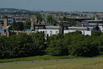 EDINBURGH, SCOTLAND - JULY 01: Competitors enter Holyrood Park during the bike leg of the IRONMAN 70.3 Edinburgh Triathlon on July 1, 2018 in Edinburgh, Scotland. (Photo by Mark Runnacles/Getty Images for IRONMAN)