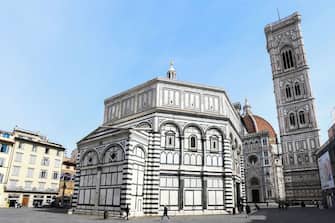 A general view taken on March 10, 2020 shows the deserted Piazza del Duomo in Florence, Tuscany, with the Battistero di San Giovanni (C) and the Santa Maria del Fiore cathedral (Rear) as Italy imposed unprecedented national restrictions on its 60 million people on March 10 to control the deadly coronavirus. (Photo by Carlo BRESSAN / AFP) (Photo by CARLO BRESSAN/AFP via Getty Images)