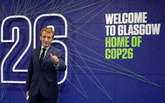 French President Emmanuel Macron arrives for the COP26 UN Climate Summit in Glasgow on November 1, 2021. - More than 120 world leaders meet in Glasgow in a "last, best hope" to tackle the climate crisis and avert a looming global disaster. (Photo by PHIL NOBLE / POOL / AFP) (Photo by PHIL NOBLE/POOL/AFP via Getty Images)