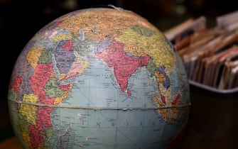 SANTA FE, NEW MEXICO - DECEMBER 9, 2019:  A vintage globe of the world for sale in an antique shop showing the Indian Ocean and surrounding countries including India, the eastern coast of Africa and countries in the Middle East including Saudi Arabia. (Photo by Robert Alexander/Getty Images) 