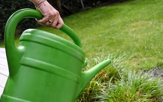 Illustration picture shows a watering can on the grass, in a garden in Edegem, Tuesday 03 May 2022. Due to the dry spring, we already have to be economical with water. Scientists call to avoid using drinking water for gardens.
BELGA PHOTO DIRK WAEM (Photo by DIRK WAEM / BELGA MAG / Belga via AFP) (Photo by DIRK WAEM/BELGA MAG/AFP via Getty Images)