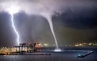 - Ashby, USA -20210127- Storm Photos of the Year Winners and Finalists
PHOTO OF THE YEAR CATEGORY: THIS PICTURE: Finalist 07. Julien Stephant.
September 7th - Genoa, Italy. A waterspout tornado moves towards the Porto di Genova Pra’ in the city 
of Genoa, Italy.

-PICTURED: General View (Storm Photos of the Year)
-PHOTO by: Julien Stephant/Storm Photos of the Year/Cover Images/INSTARimages.com
-41329047.jpg

This is an editorial, rights-managed image. Please contact Instar Images LLC for licensing fee and rights information at sales@instarimages.com or call +1 212 414 0207 This image may not be published in any way that is, or might be deemed to be, defamatory, libelous, pornographic, or obscene. Please consult our sales department for any clarification needed prior to publication and use. Instar Images LLC reserves the right to pursue unauthorized users of this material. If you are in violation of our intellectual property rights or copyright you may be liable for damages, loss of income, any profits you derive from the unauthorized use of this material and, where appropriate, the cost of collection and/or any statutory damages awarded