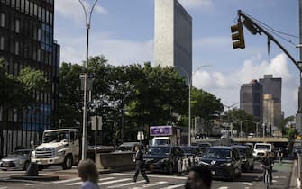 epa10002428 Heavy traffic rolls on 1st Avenue in front of the UN headquarters in New York, USA, 08 June 2022. The UN General Assembly will vote 09 June on Switzerland's candidacy to the Security Council for the period 2023-2024.  EPA/ALESSANDRO DELLA VALLE