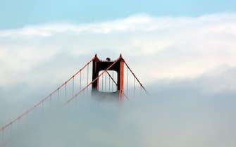 UNITED STATES - JULY 14:  Fog rolls across the Golden Gate Bridge, San Francisco, California (Photo by Carol M. Highsmith/Buyenlarge/Getty Images)