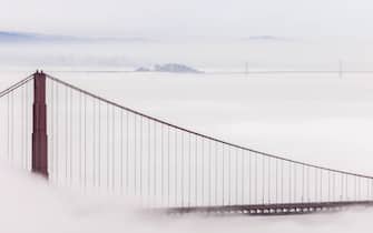 SAUSALITO, CA - MARCH 2:The Golden Gate Bridge and the San Francisco - Oakland Bay Bridge is seen surrounded by a layer of fog from the Marin Headlands in Sausalito, California on Wednesday, March 2, 2022.  (Stephen Lam/San Francisco Chronicle via Getty Images)
