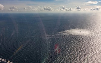epa10209594 A handout photo taken from a Danish F-16 jet on 27 September 2022 and made available by the Danish Defence Command shows a gas leak of the Nord Stream 2 pipeline off Bornholm, Denmark, Baltic Sea. The Danish energy agency confirmed 27 September 2022 three gas leaks on the Nord Stream 1 and 2 pipelines.  EPA/Danish Defence Command / HANDOUT  HANDOUT EDITORIAL USE ONLY/NO SALES