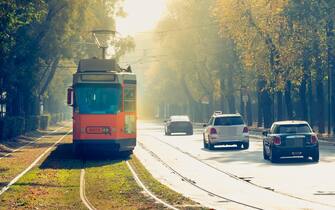 MILAN, ITALY - November 03, 2017 : old tram line 12 of the company Azienda Trasporti Milanesi circulating in the city. The network was inaugurated in