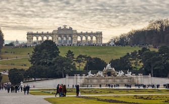 VIENNA, AUSTRIA - DECEMBER 30: (EDITORS NOTE: Image is a digital [High Dynamic Range, HDR] composite.) Tourists walk in the garden of the Schonbrunn Palace (in German: SchloÃ  SchÃ¶nbrunn) on December 30, 2019 in Vienna, Austria. (Photo by Laszlo Szirtesi/Getty Images)