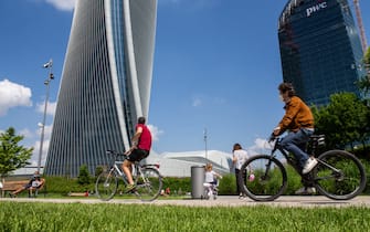 MILAN, ITALY - MAY 10: Some cyclists in CityLife Park during the first sunday of phase two of the containment of the pandemic from Covid-19  on May 10, 2020 in Milan, Italy. Italy was the first country to impose a nationwide lockdown to stem the transmission of the Coronavirus (Covid-19), and its restaurants, theaters and many other businesses remain closed. (Photo by Roberto Finizio/Getty Images)